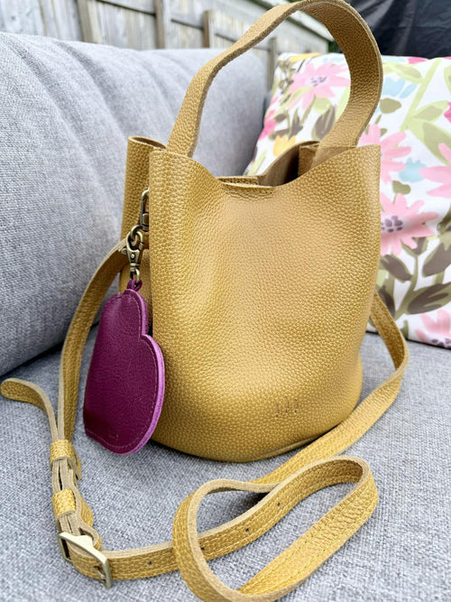 The small Belle Bucket Bag in sunshine is everything I didn’t know I needed! - customer review photo