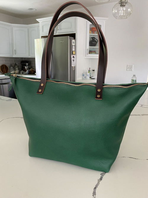 Gorgeous tote! The color is amazing! Many compliments in the brief time I’ve owned it - customer review photo