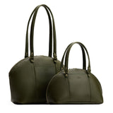Pebbled Olive | Size comparison of the large and small half circle crossbody bag with handles and removable crossbody strap 
