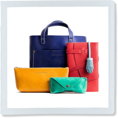 Promotional graphic for a 'Medium Tote Mystery Box' featuring a collection of totes, wallets, and small goods. Set against a sparkly background with a pink badge indicating up to $248 value.