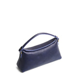 Cobalt | Leather bowler bag with magnetic closure against a white background