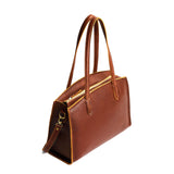 Nutmeg Large | Leather tote bag with handles, adjustable crossbody strap, zipper top, and two back pockets