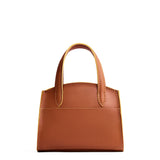 Honey Mini | Leather tote bag with handles, adjustable crossbody strap, zipper top, and a back pocket