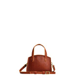 Nutmeg Mini | Leather tote bag with handles, adjustable crossbody strap, zipper top, and a back pocket