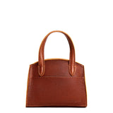 Nutmeg Mini | Leather tote bag with handles, adjustable crossbody strap, zipper top, and a back pocket