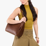 Asheville Large | U-shaped, flat-bottomed leather shoulder bag with adjustable strap
