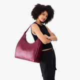 Orchid Oversized | U-shaped, flat-bottomed leather shoulder bag with adjustable strap