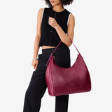Orchid Oversized | U-shaped, flat-bottomed leather shoulder bag with adjustable strap