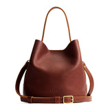 Nutmeg Large | Symmetrical bucket bag with handle, latch closure, and removable crossbody strap