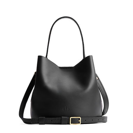 Black*Large | Symmetrical bucket bag with handle, latch closure, and removable crossbody strap
