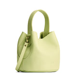 Shadow Lime Small | Symmetrical bucket bag with handle, latch closure, and removable crossbody strap