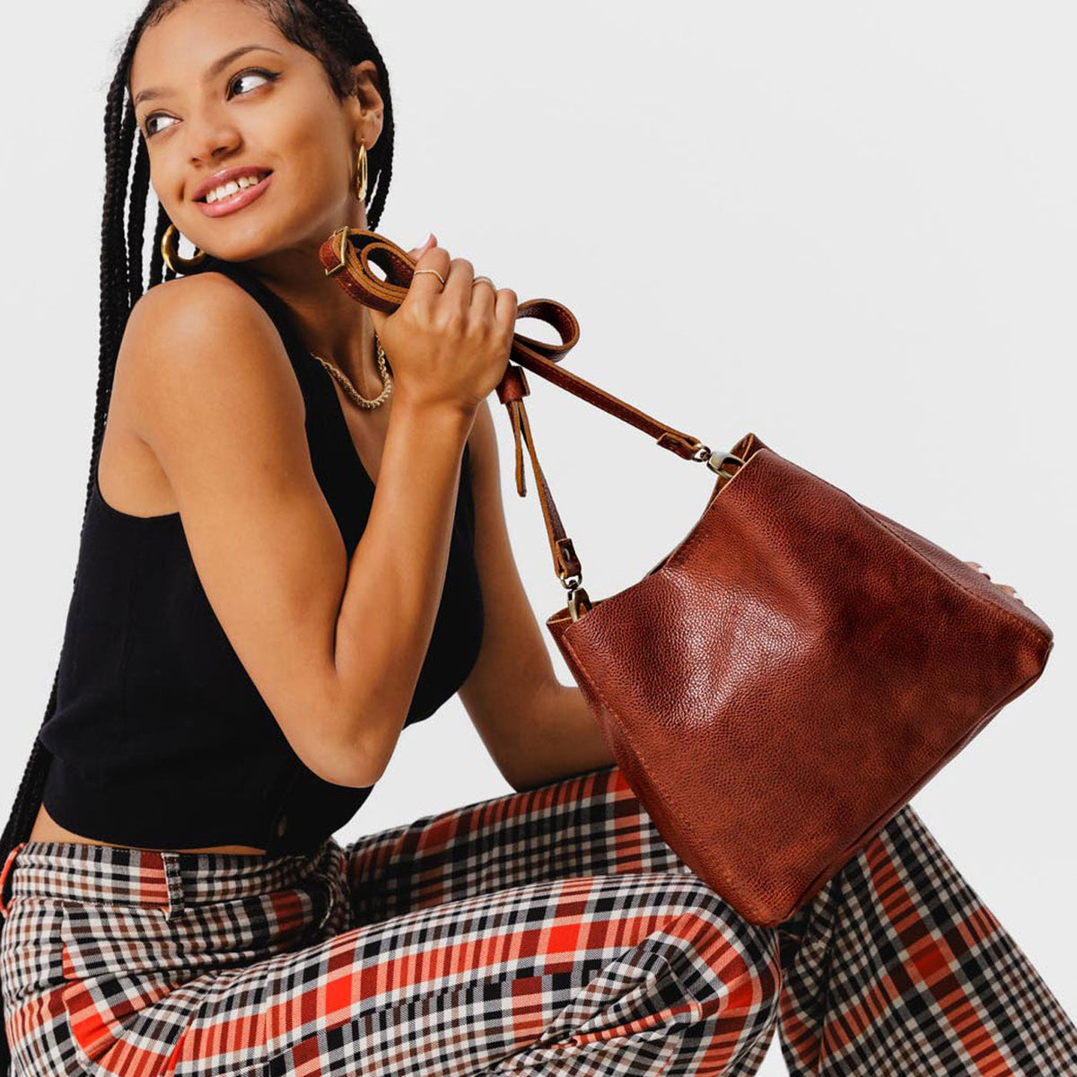 Nutmeg | symmetrical bucket bag with latch closure and removable crossbody strap