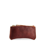Nutmeg Small | Small pouch with a top zipper and unique curved bottom