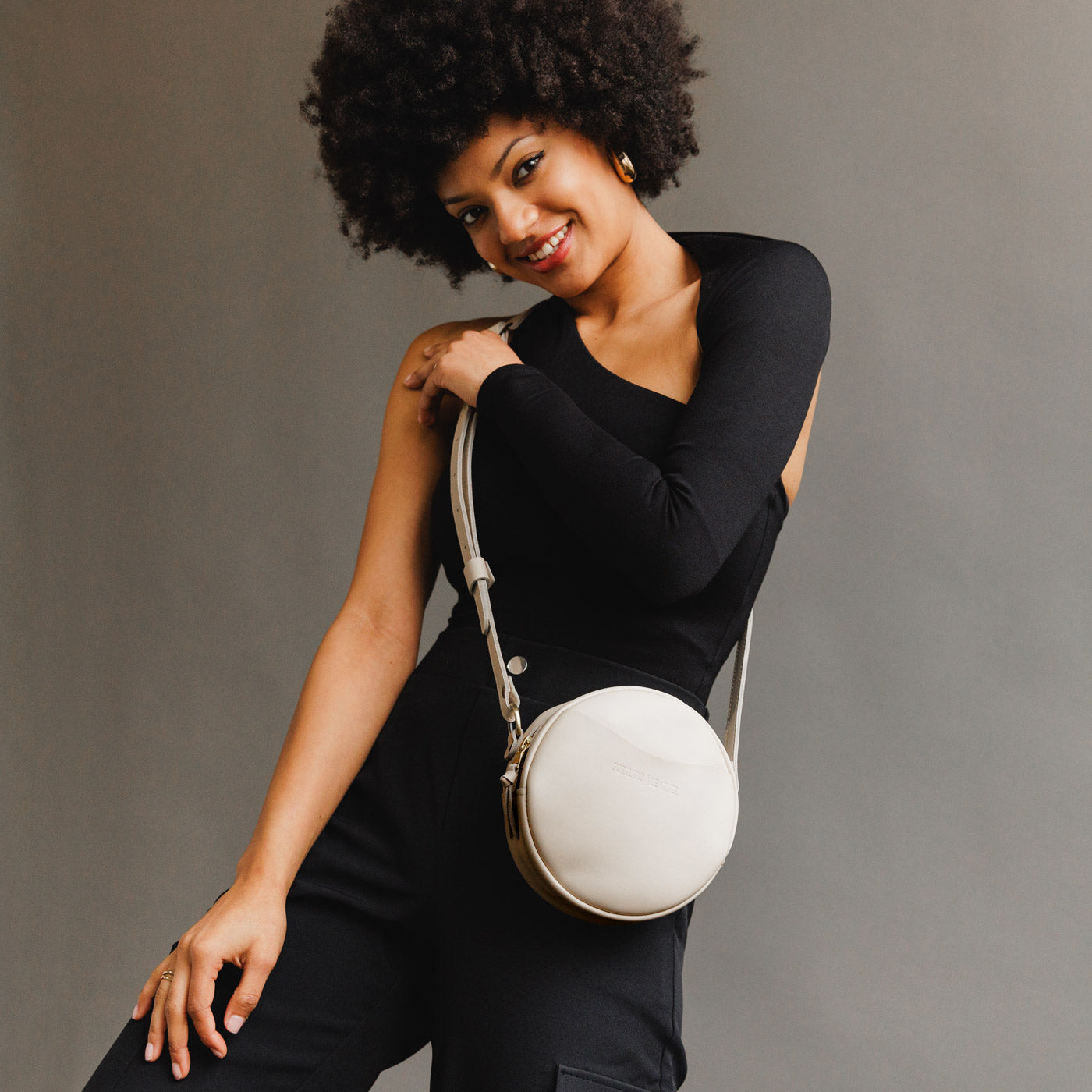 Bone*Small | Circle shaped crossbody bag with top zipper