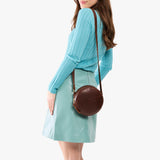 Cognac Small | Circle shaped crossbody bag with top zipper