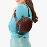 Cognac Small | Circle shaped crossbody bag with top zipper