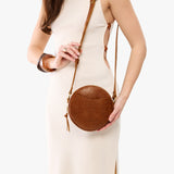 Meadow Small | Circle shaped crossbody bag with top zipper
