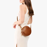 Meadow Small | Circle shaped crossbody bag with top zipper