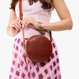 Nutmeg Small | Circle shaped crossbody bag with top zipper
