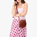 Nutmeg Small | Circle shaped crossbody bag with top zipper