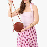Nutmeg Small | Circle shaped crossbody bag with top zipper