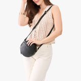 Pebbled--black Small | Circle shaped crossbody bag with top zipper