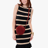 Phoenix Small | Circle shaped crossbody bag with top zipper