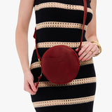 Phoenix Small | Circle shaped crossbody bag with top zipper