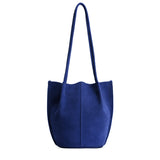 Joni Blue Small | Petite bucket shaped tote bag with matching leather handles