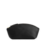 Black Eclipse | Spacious leather makeup bag with curved seams and top zipper