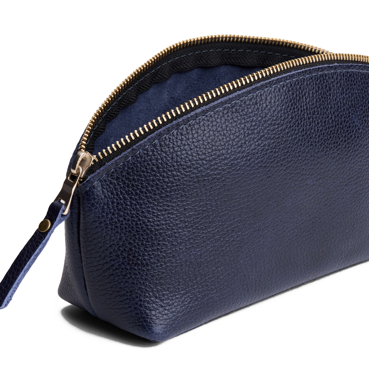Cobalt | Spacious leather makeup bag with curved seams and top zipper open