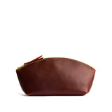 Cognac Eclipse | Spacious leather makeup bag with curved seams and top zipper