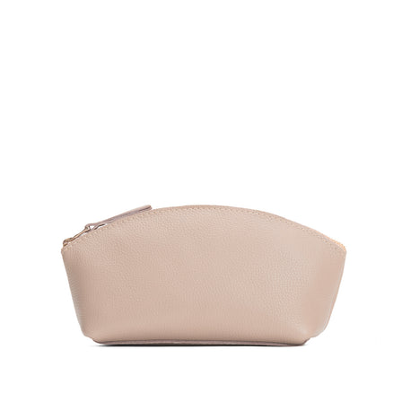 Oatmilk*Total Eclipse | Spacious leather makeup bag with curved seams and top zipper