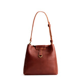 Nutmeg Small | Symmetrical leather bag with leather drawstring closure and back ring for accessories