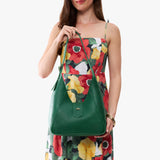 Bacalar | Model wearing structured hobo shoulder bag with adjustable strap and magnetic closure