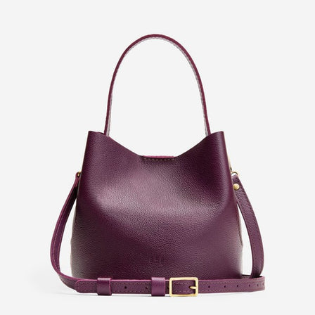 Plum*Small | Symmetrical bucket bag with handle, latch closure, and removable crossbody strap