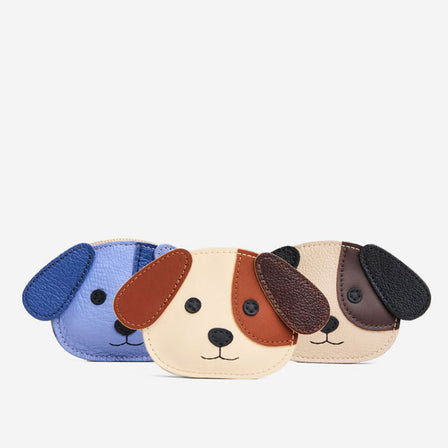 Aster | A small dog-shaped leather pouch with embroidered facial details and a wrist strap.