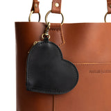Black | Heart-shaped leather pouch keychain with zipper top and lobster clasp
