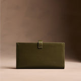 Bay Green Large | Leather bifold wallet with a strap and bar closure