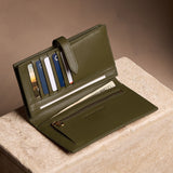 Bay Green Large | Leather bifold wallet with a strap and bar closure