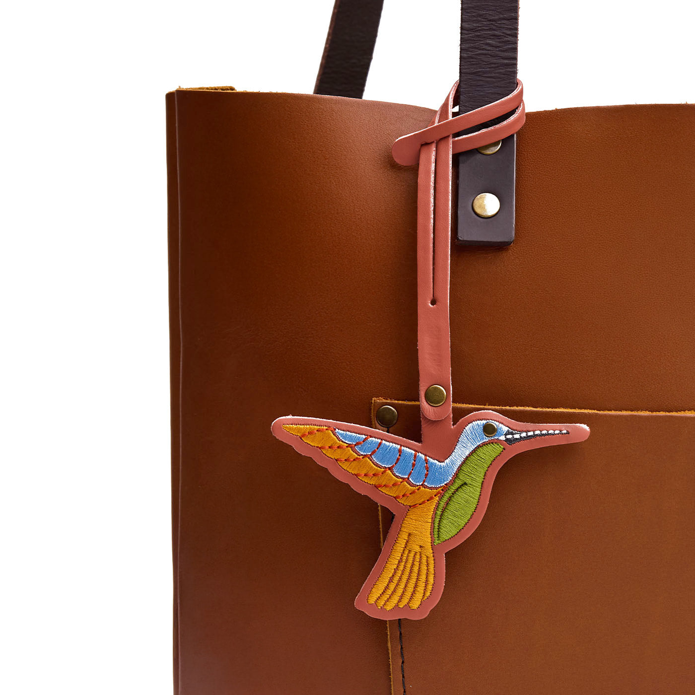 Apricot Brandy | Multi-colored hummingbird embroidered on a leather tassel