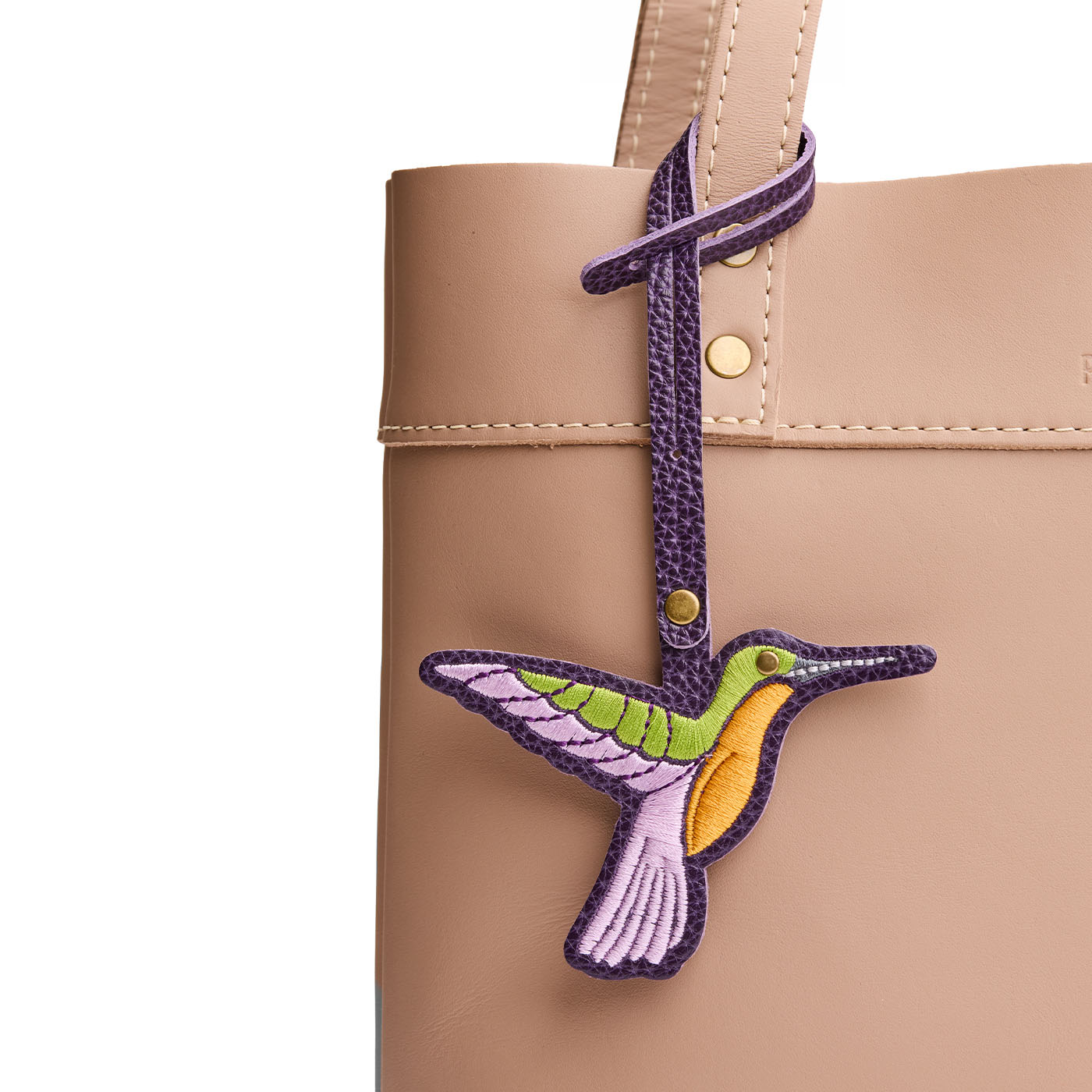 Empire | Multi-colored hummingbird embroidered on a leather tassel