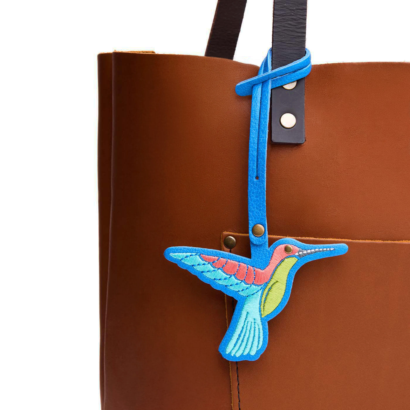 Skydive | Multi-colored hummingbird embroidered on a leather tassel