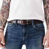 All Variants | A person wearing the Italian Reversable Leather Belt on the brown side