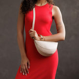 Bone Small | Model wearing petite half circle shaped sling bag