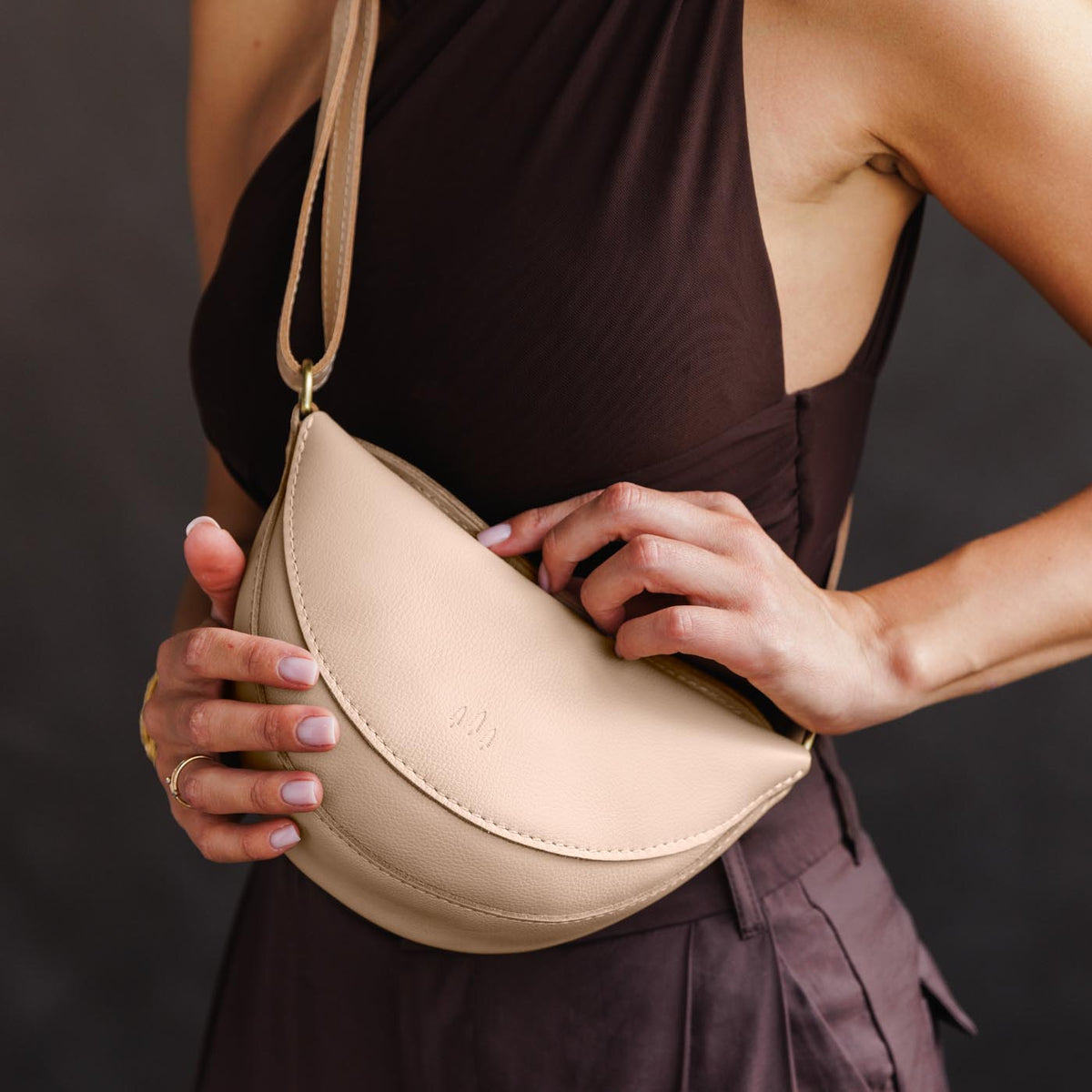 Moonflower*Small | Model wearing petite half circle shaped sling bag