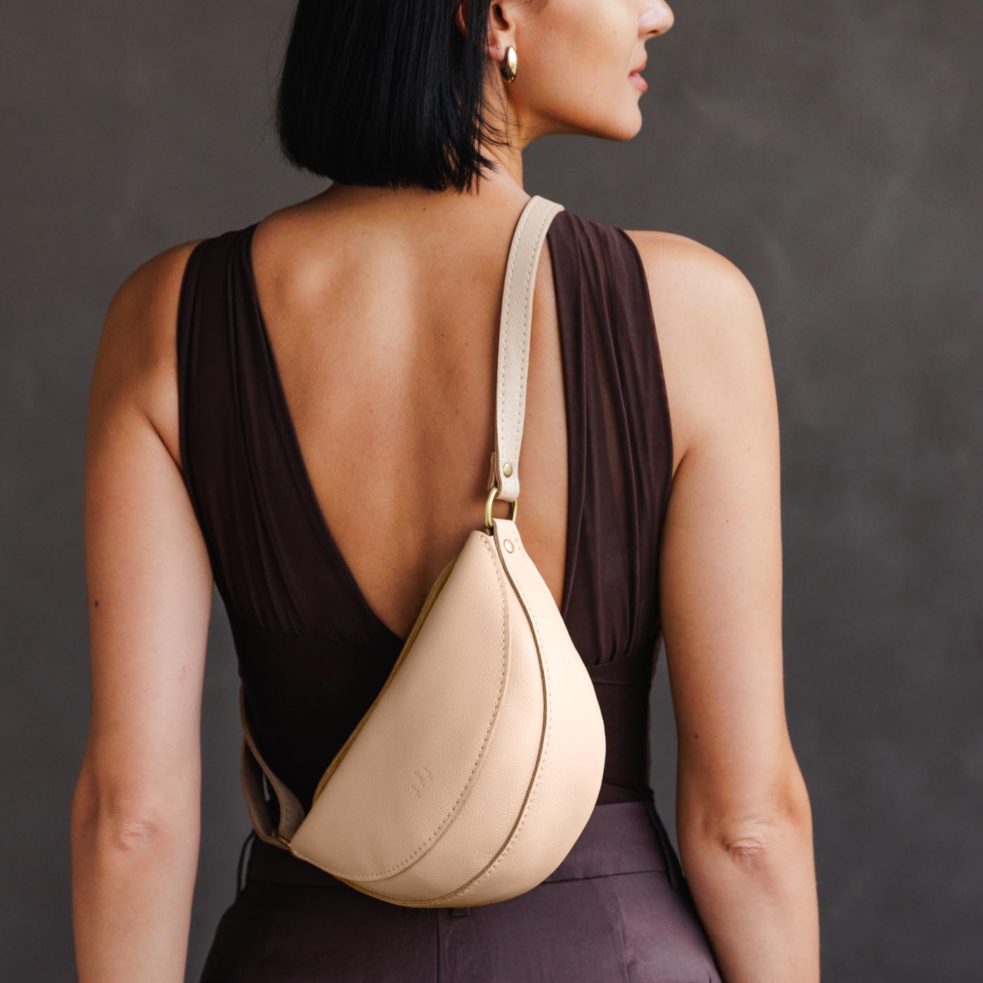 Moonflower*Small | Model wearing petite half circle shaped sling bag