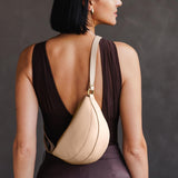 Moonflower Small | Model wearing petite half circle shaped sling bag