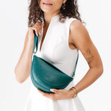 Sea Glass Small | Model wearing petite half circle shaped sling bag