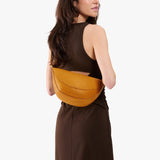 Sunshine Medium | Model wear half circle shaped sling bag
